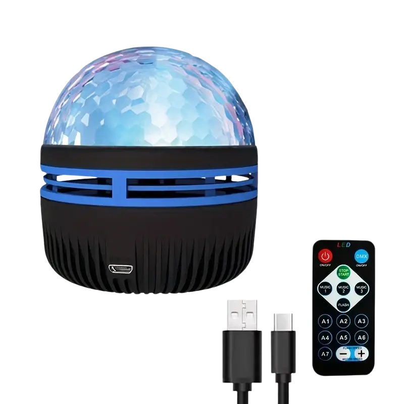Blue and black spherical led galaxy projector with faceted dome top, remote control, and usb charging cables visible