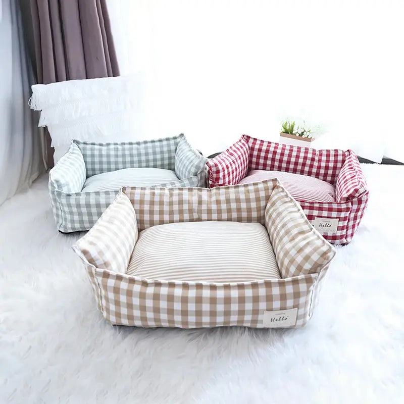 please allow a plush gingham check pet bed cotton dog sofa featuring three cozy beds with checkered fabric exteriors and striped cushion interiors in beige-and-brown, green-and-white, and red-and-white gingham patterns.