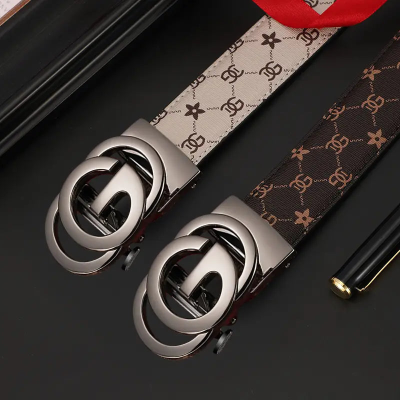 Two gucci men leather automatic buckle belts feature silver-toned interlocking g logo buckles and matching patterned leather straps in beige and brown.
