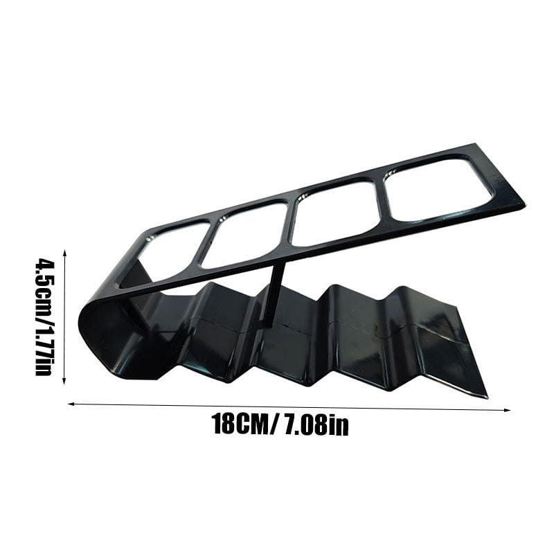Black glossy metal remote control organizer desktop storage rack with a zigzag base and five rectangular slots for sorting devices.