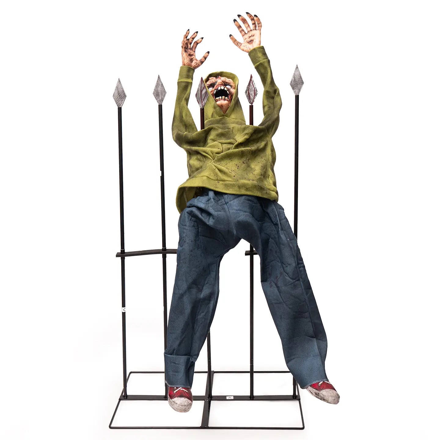 an animated green distressed zombie figure seated on a black metal throne with spikes as a halloween fence breaker decoration.
