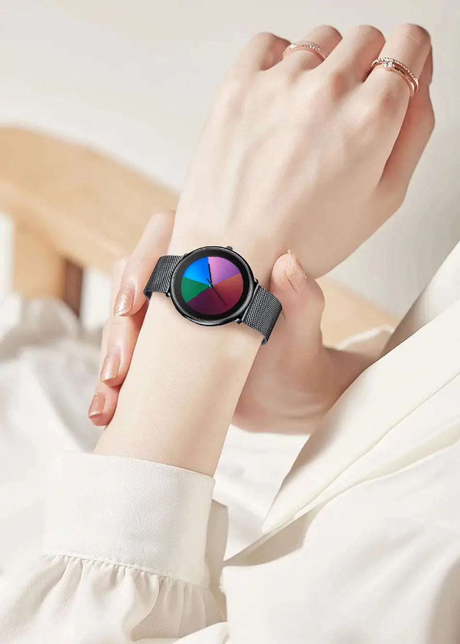 Lige women rainbow dial quartz watch with a black mesh strap and a circular face displaying vibrant rainbow-colored segments.