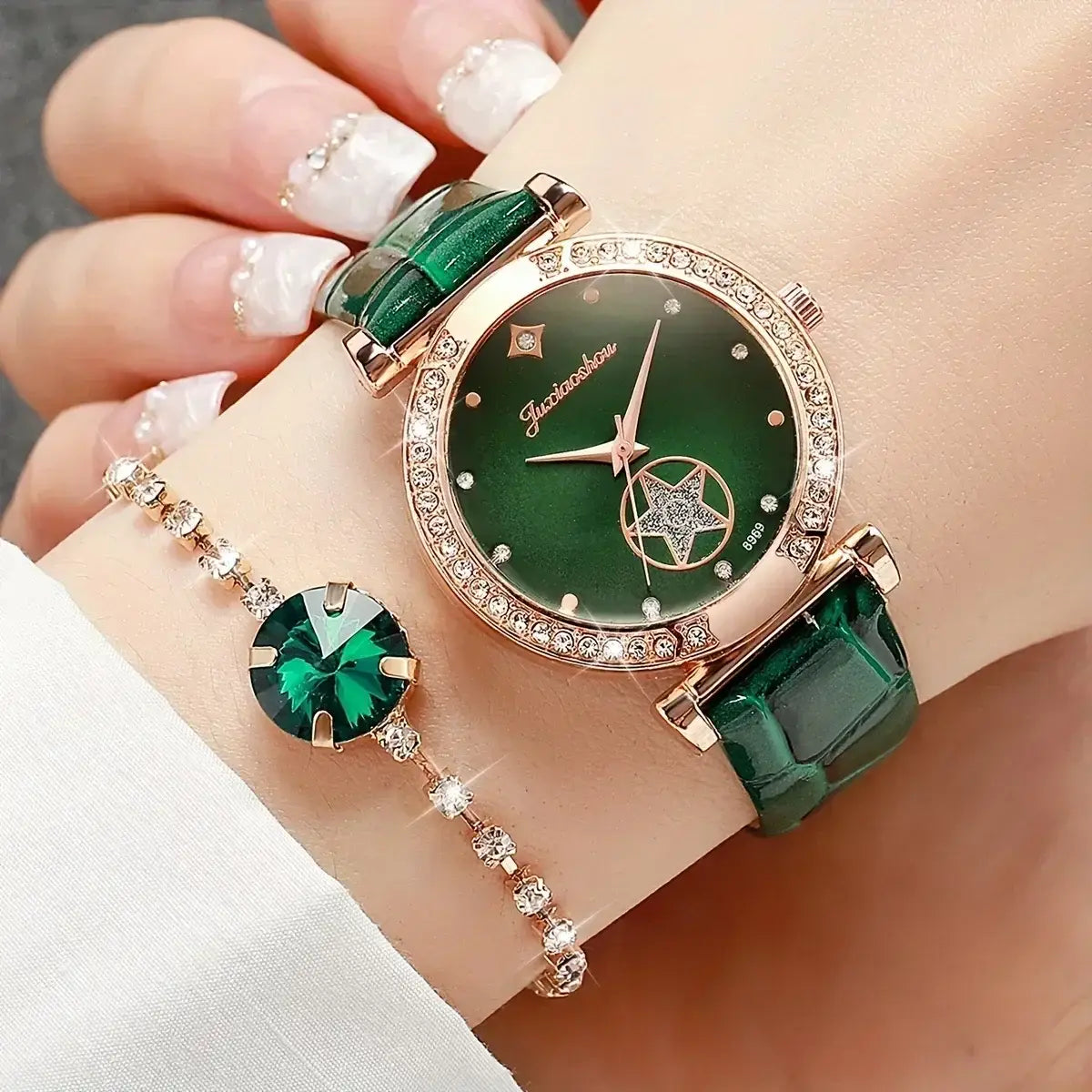 Emerald green quartz watch for women with rose gold accents star motif dial and alligator-textured strap in a jewelry set.