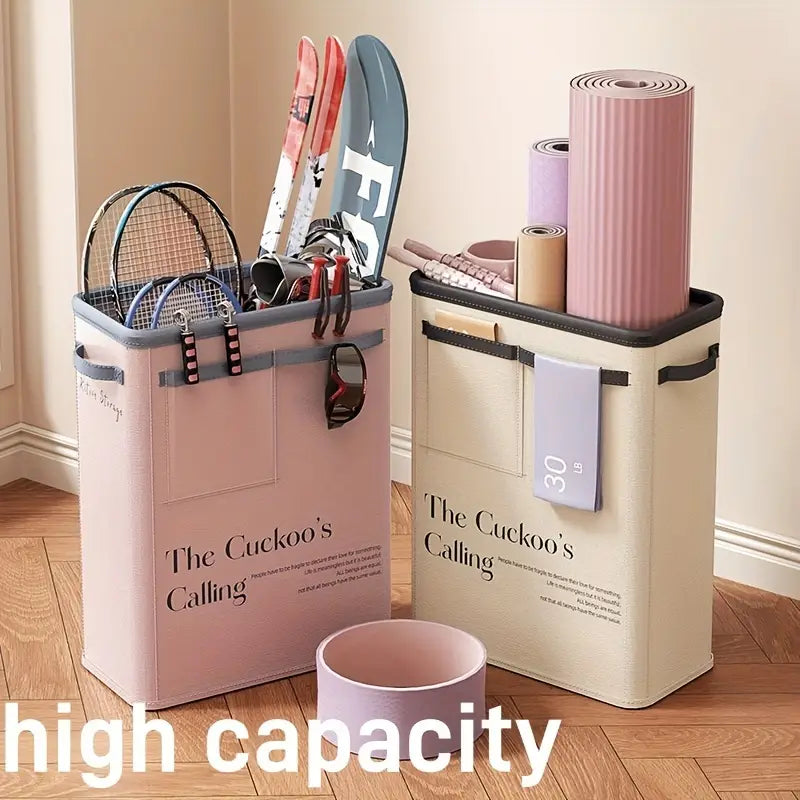 pink and beige fabric yoga mat storage basket fitness organizer with the cuckoo’s calling printed on the front