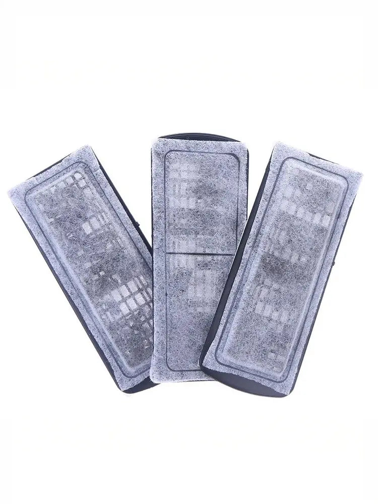 three gray rectangular microfiber aquarium carbon filter cotton pads with black rubber edges and a grid-like pattern on the surface manual measurement may vary