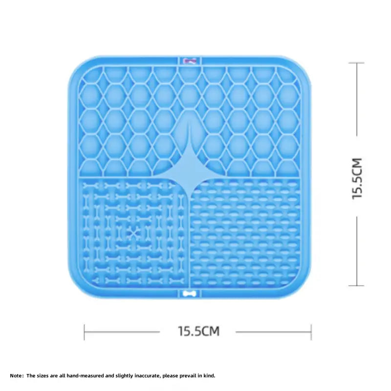 Blue slow feeder pet lick silicone mat with honeycomb texture and divided sections for different food types designed for dogs.