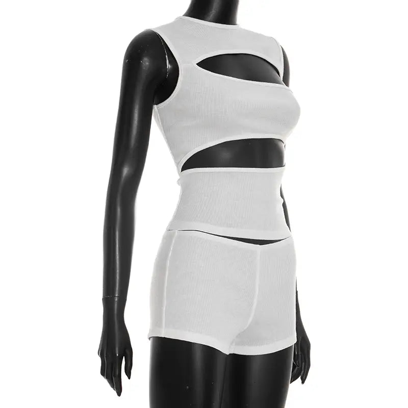 white ribbed knit two-piece set featuring cut-out details with a tank top and shorts designed for casual wear
