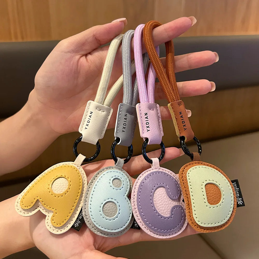 A To Z Leather Initials Keychain Braied Wristband Pendant Keyring for Women Men Car Bag Charms Camera Phone Case Accessories