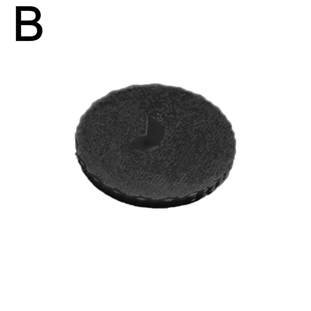 Capuchon de vis de remplacement pour téléphone CMF 1, circulaire, noir texturé, avec un bord légèrement surélevé et une petite indentation centrale