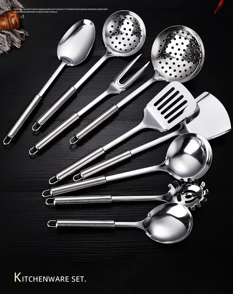 Shiny stainless steel kitchen utensil set featuring spoons ladles slotted spatulas and a fork with perforated heads in a 9-piece cooking tools set.