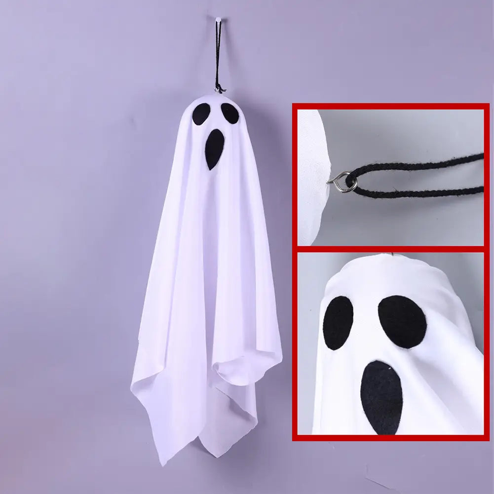 white ghost-shaped hanging towel with black eye and mouth patches as a led hanging ghost halloween decoration