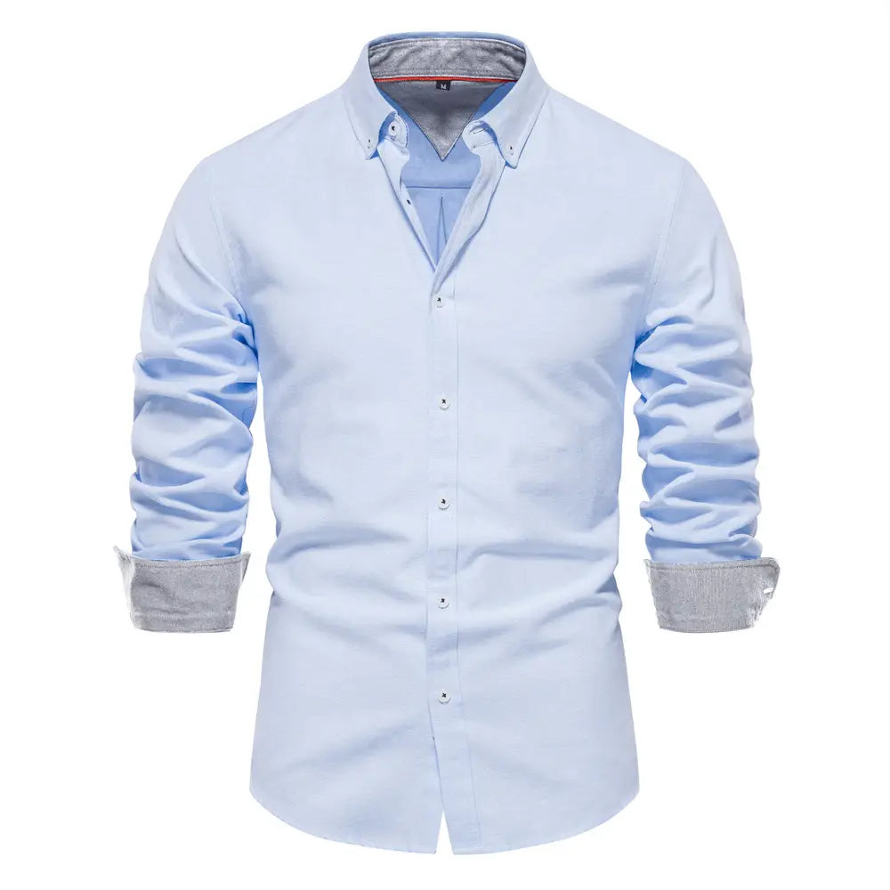 Light blue dress shirt with long sleeves and button-down front featuring gray contrast collar lining and cuffs, designed as a fashion social shirt for men.