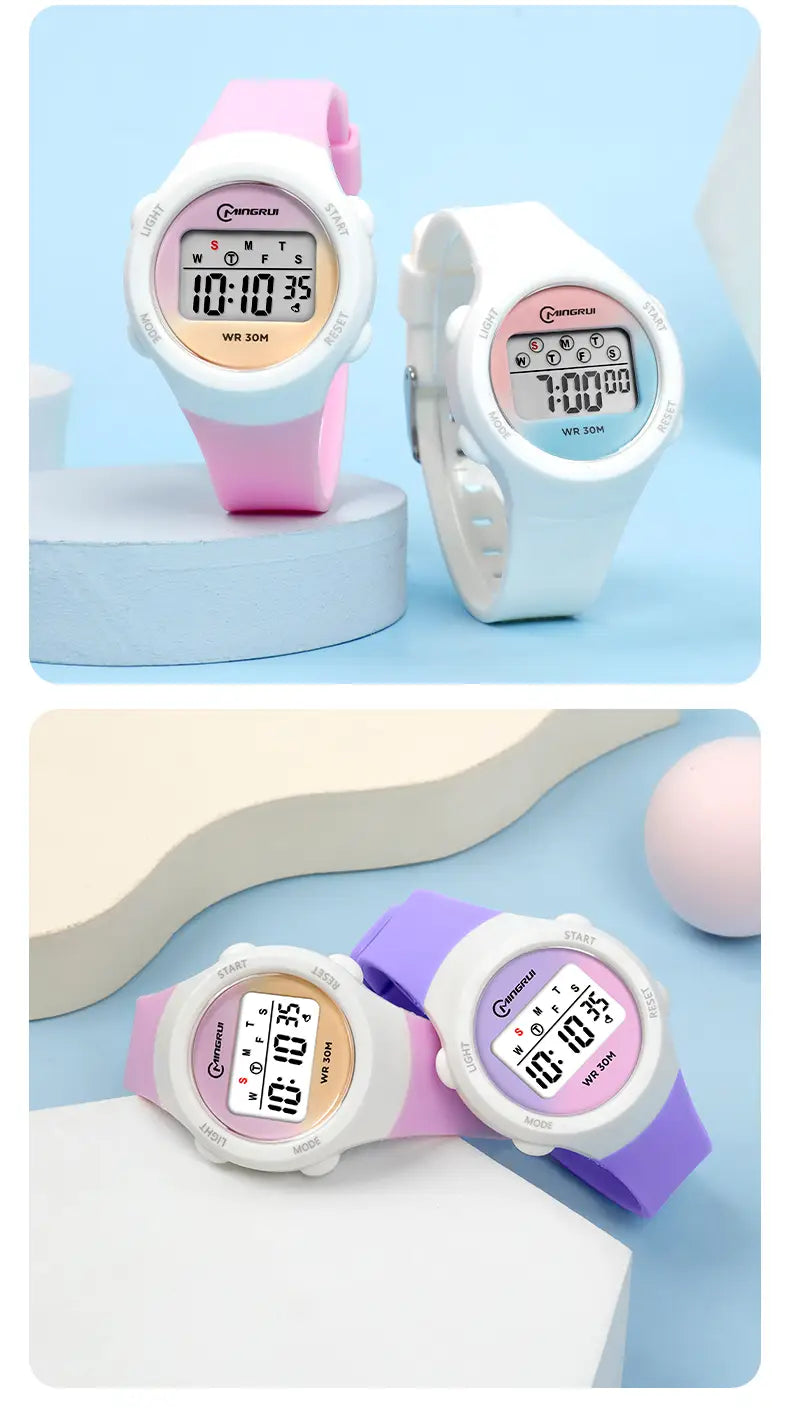 Kids waterproof digital sports watches in pink and white with silicone straps featuring a round face and clear display.