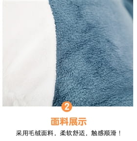 A close-up of the soft plush blue fleece fabric with a smooth texture and gentle folds on the plush blue shark stuffed animal pillow.