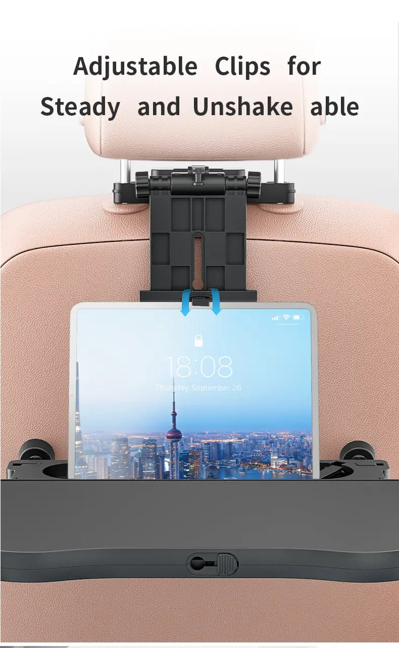 black adjustable car headrest clip holding a tablet securely in place for use with a car headrest laptop tray and food holder