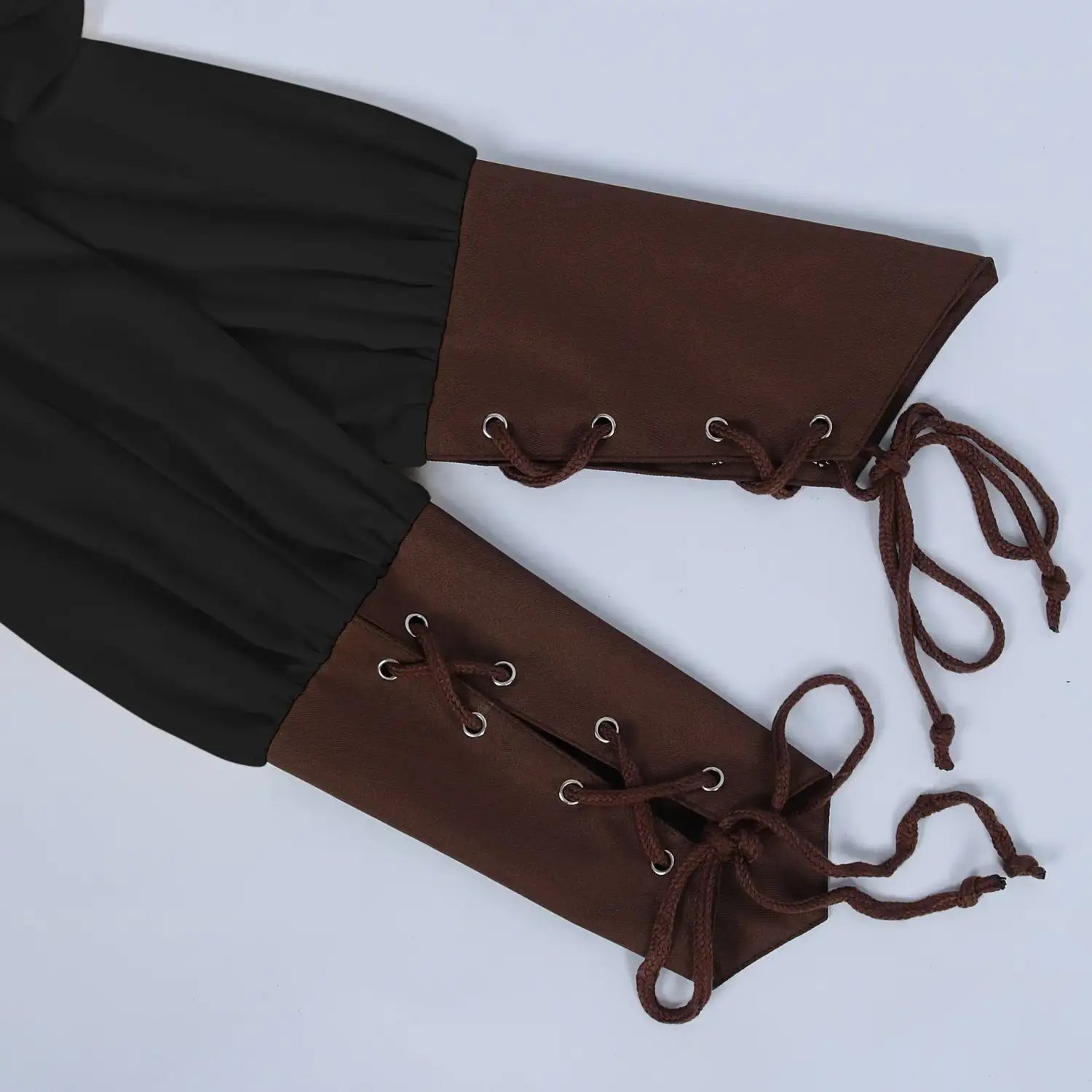 Brown fabric leg warmers with black cuffs and lace-up detailing visible from the front for mens pirate medieval renaissance attire by arba global.
