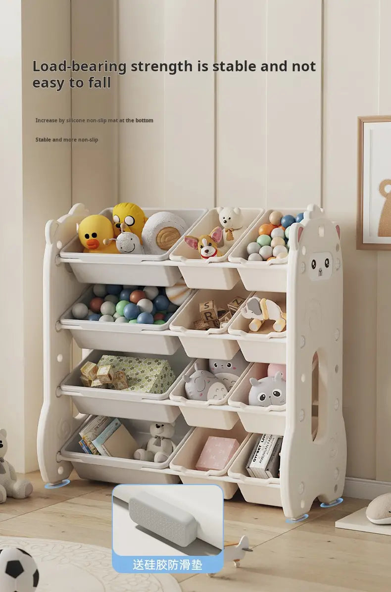 Étagère de rangement pour jouets pour enfants en plastique de couleur crème, avec un design de visage de chat et plusieurs compartiments, pour un rangement ordonné de la salle de jeux.