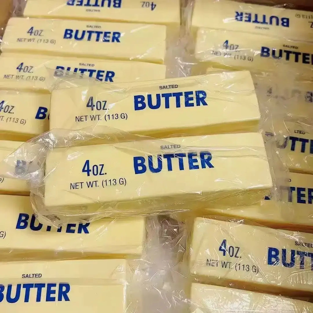 Yellow salted butter sticks individually wrapped in clear plastic with blue labeling for stress relief squishy toy