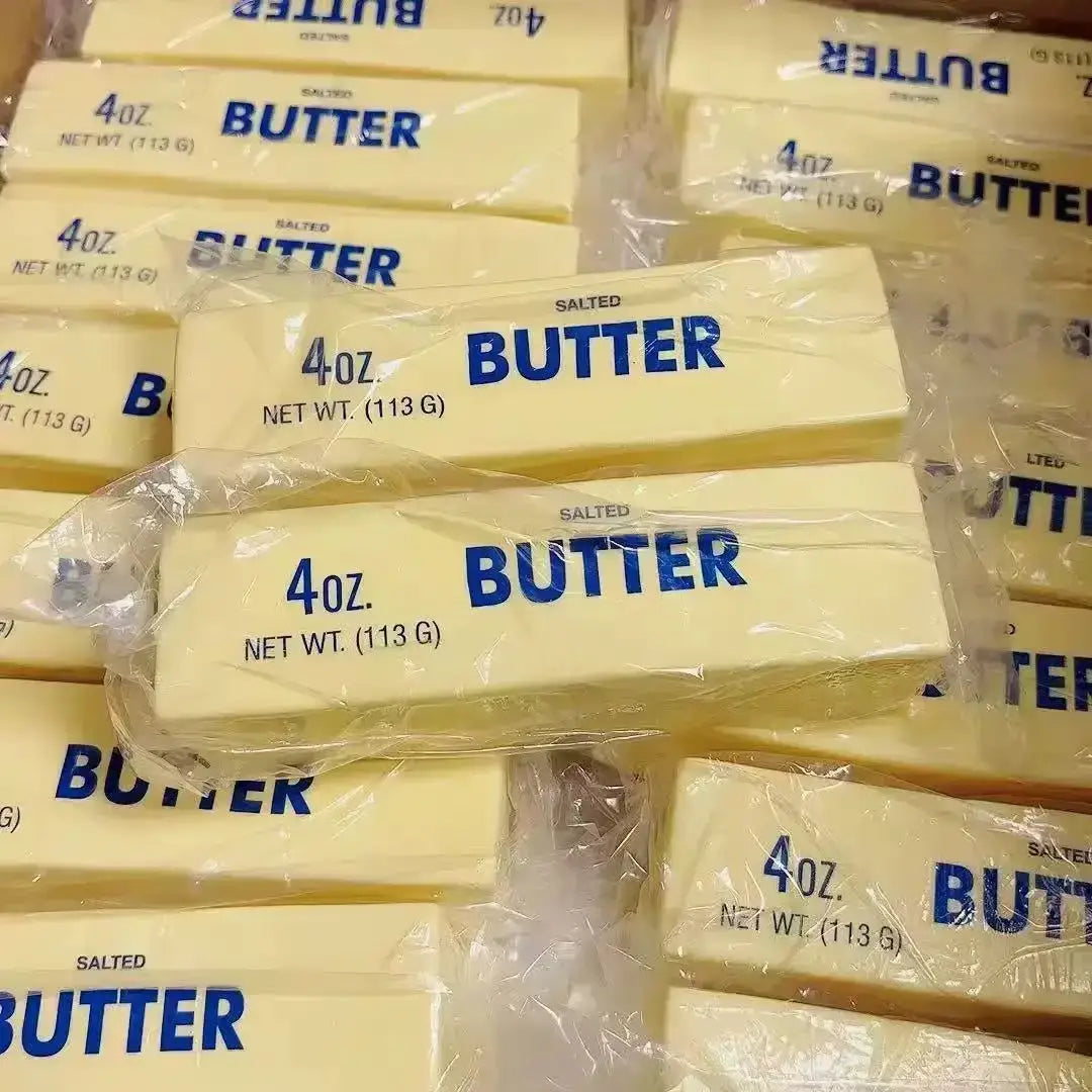 Yellow salted butter sticks individually wrapped in clear plastic with blue labeling for stress relief squishy toy