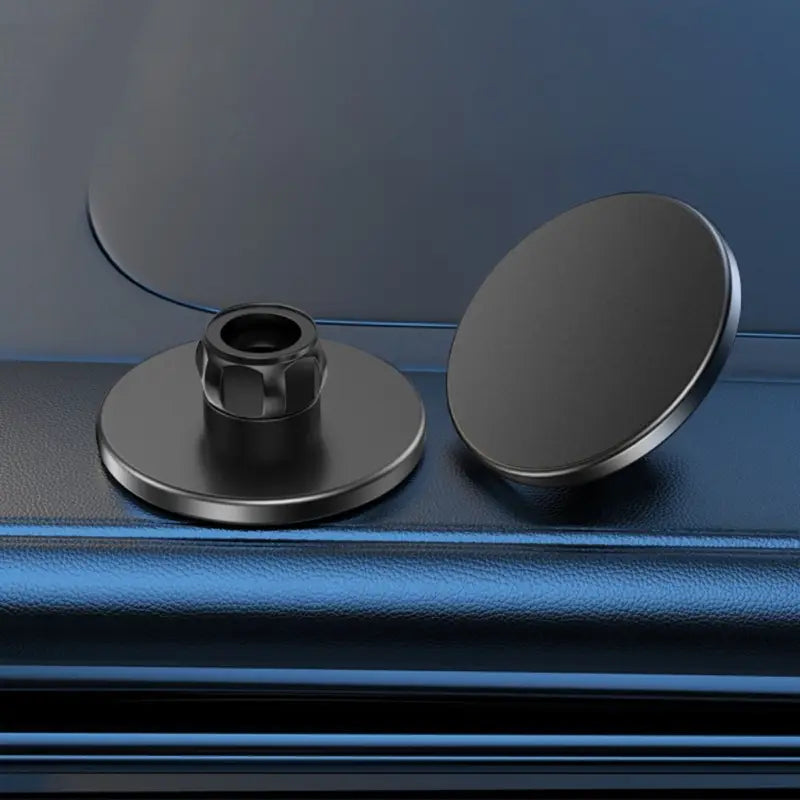 soporte de teléfono para automóvil magnético metálico negro con base circular y centro roscado para iPhone 12 13 14 15, mostrado desde el lado posterior.
