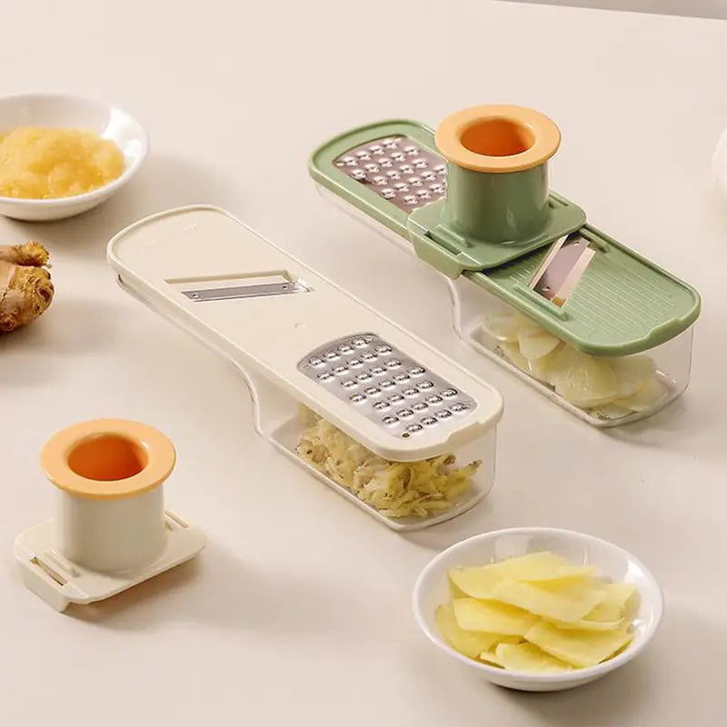 Trancheuse multifonction blanche et verte pour légumes avec lames interchangeables en acier inoxydable conçue pour le broyage de l’ail et le hachage des aliments en tant que hachoir à ail
