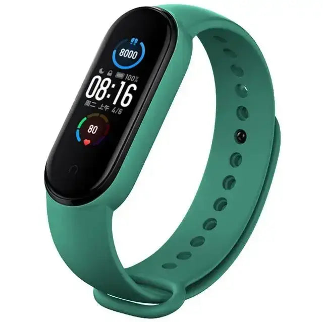 Teal xiaomi mi band with wristband silicone bracelet featuring a black display screen showing time steps and heart rate.