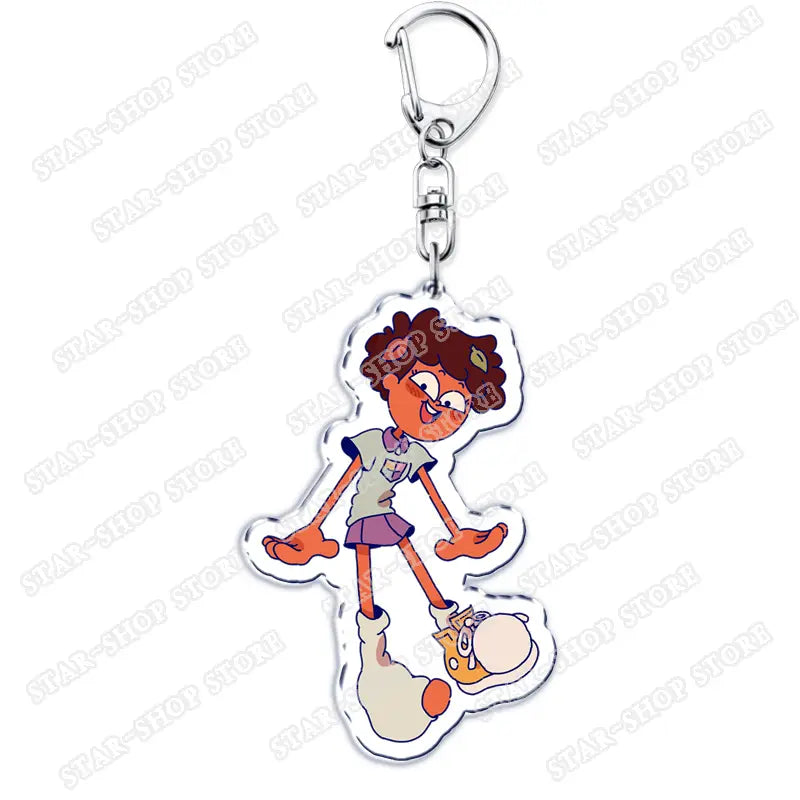 clear acrylic amphibia anime keychain featuring a cartoon character with brown curly hair wearing a light green shirt and purple skirt standing next to a small white creature.