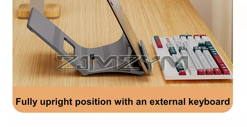Gray plastic tablet stand with textured grip lines shown as part of an aluminum laptop stand adjustable silver desk holder.