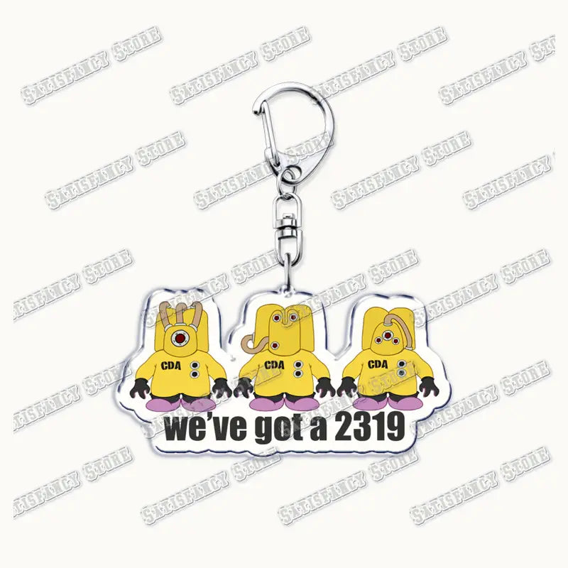 Yellow acrylic 9-1-1 TV show keychain featuring three cartoonish cda characters with black gloves and pink shoes hanging from a silver metal clasp.