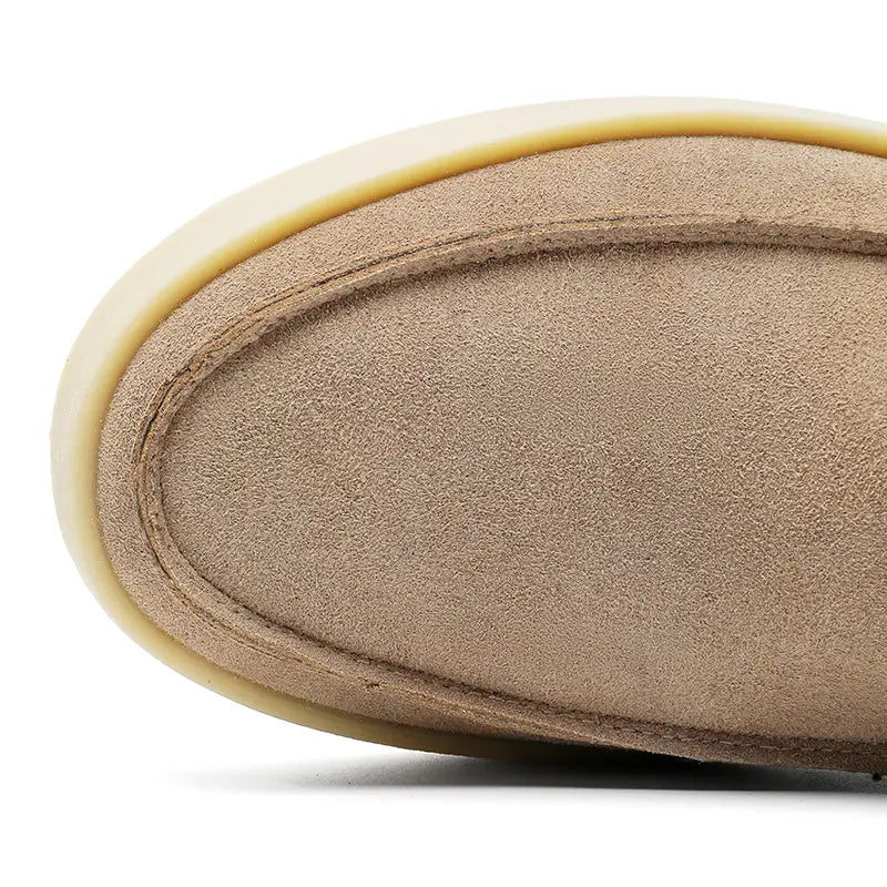 Men casual suede loafers slip on walking shoes featuring a tan suede upper with a pale yellow rubber sole.