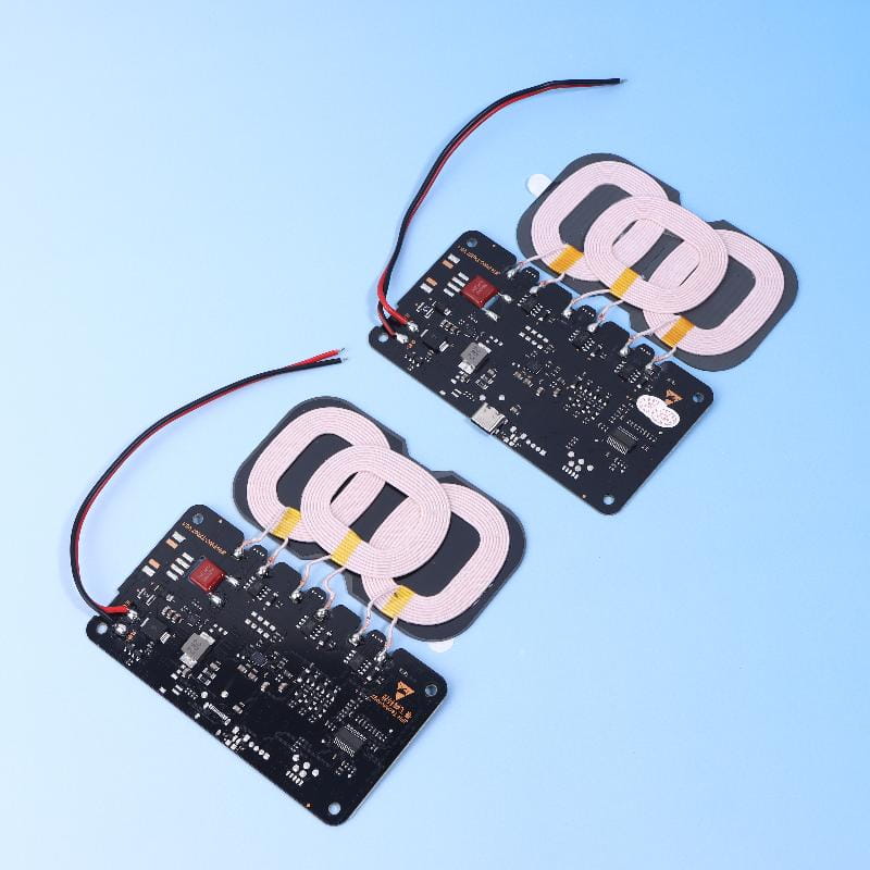 Two black 20w wireless charger modules for car and home with pink coil coils and red and black wires shown from the back side.