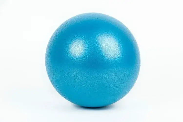 A smooth matte-finish blue anti-burst yoga ball with a slightly textured surface designed for balance training and air leakage prevention.