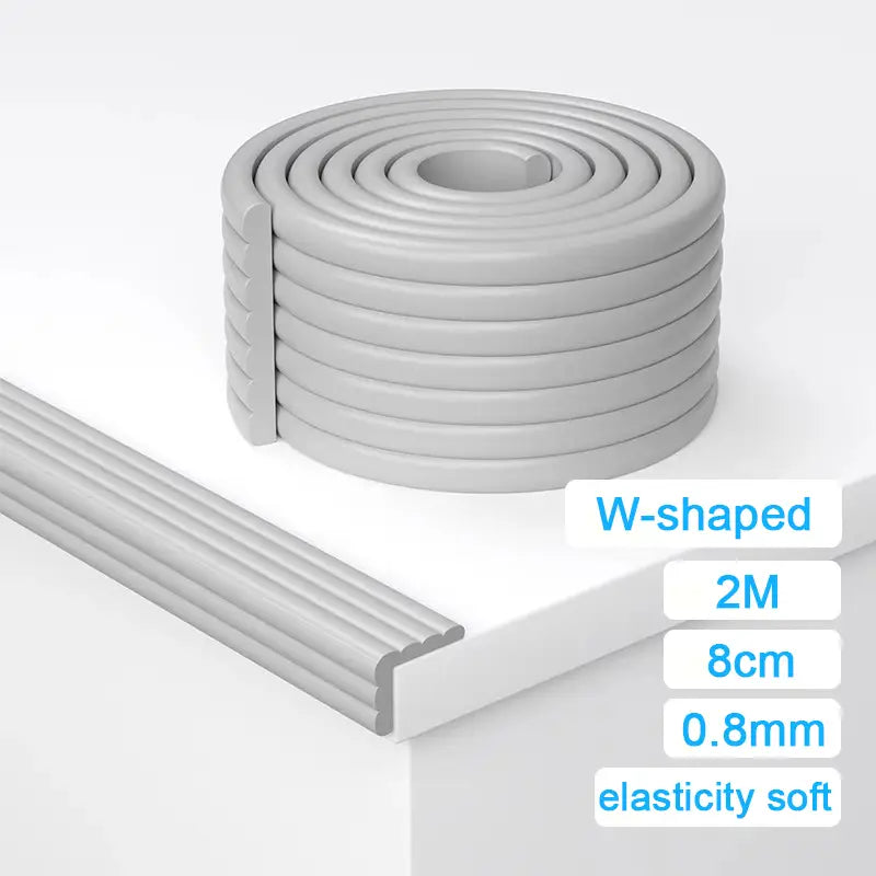 gray w-shaped foam edge protector strip 2 meters long and 8 cm wide designed for baby safety and cushioning sharp corners