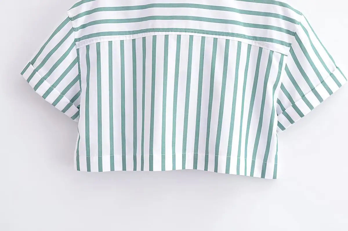 Green striped short sleeve crop shirt with a classic white and mint green vertical striped pattern made from lightweight fabric.