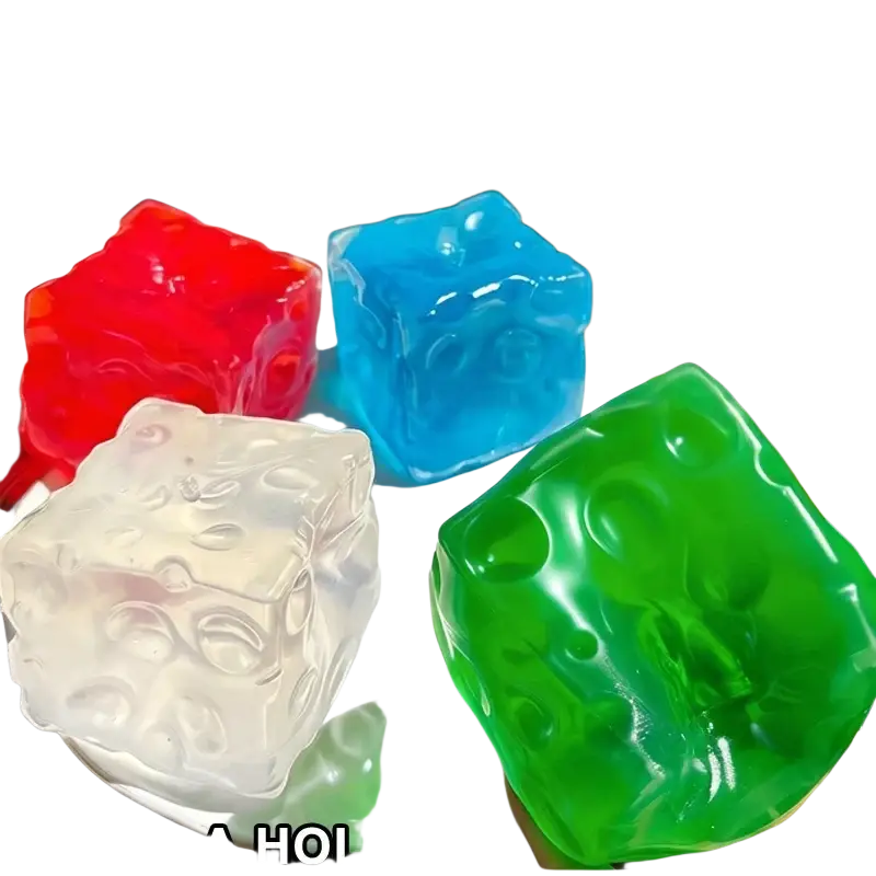 Colorful vaseline cheese squishy toys in red blue white and green shaped like cheese viewed from above