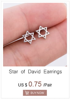 Silver star of David earrings featuring a delicate minimalist design paired with a gold angel number 7 necklace.