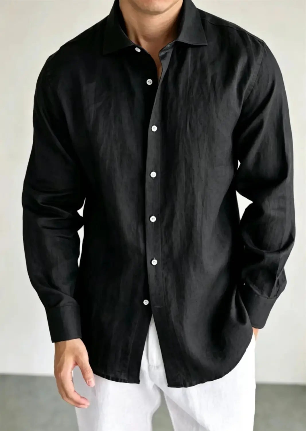 black linen button-down shirt with white buttons made from cotton linen for casual wear for men