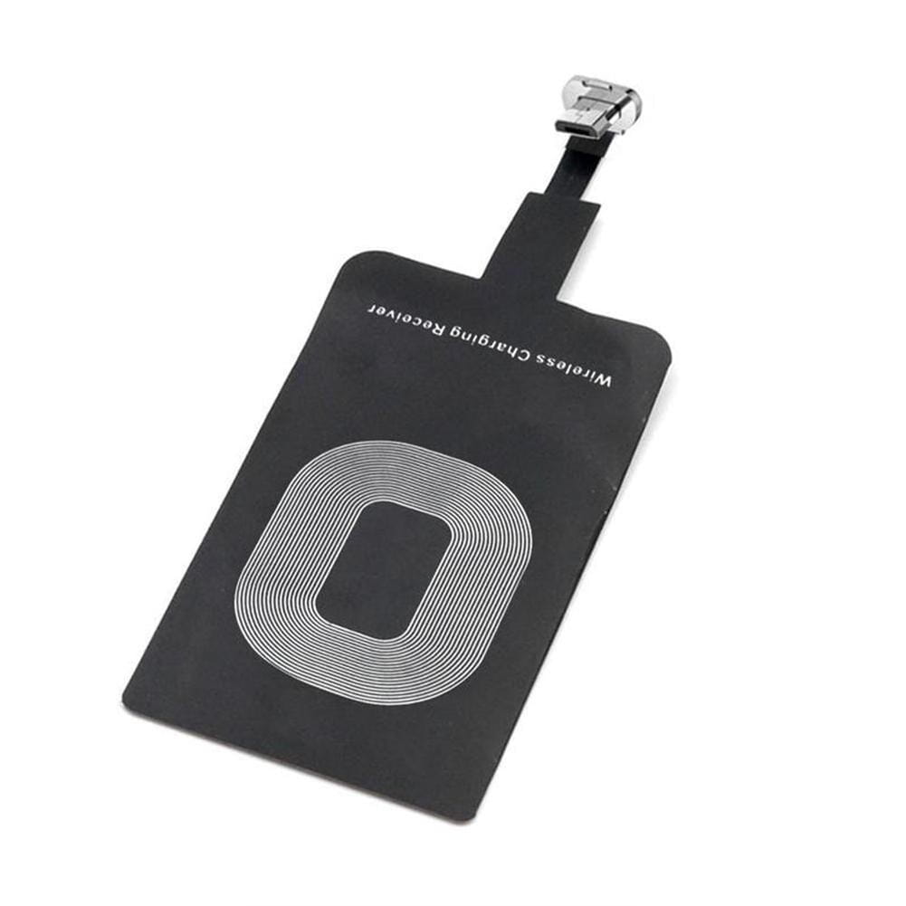 Black wireless charging receiver for type c android phones with a silver metallic connector and a white concentric circular pattern.