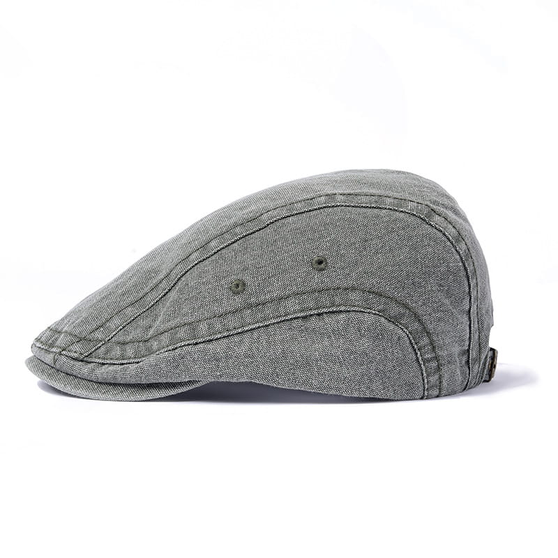 Graue Denim-Flachmütze im Vintage-Béret-Stil, verstellbar, mit geformtem, leicht gewölbtem Schirm und sichtbaren Nähten.