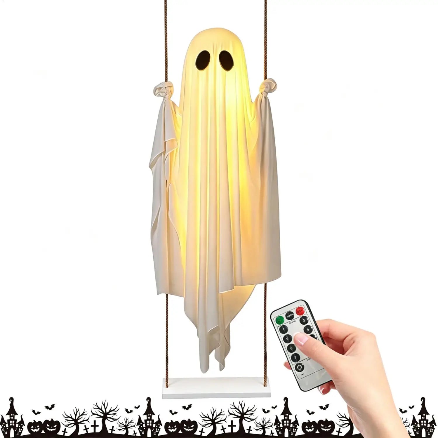 una decoración de fantasma colgante oscilante iluminada y blanca hecha de tela translúcida en movimiento con recortes negros para los ojos, diseñada como decoración de fantasma colgante iluminada para uso exterior en Halloween