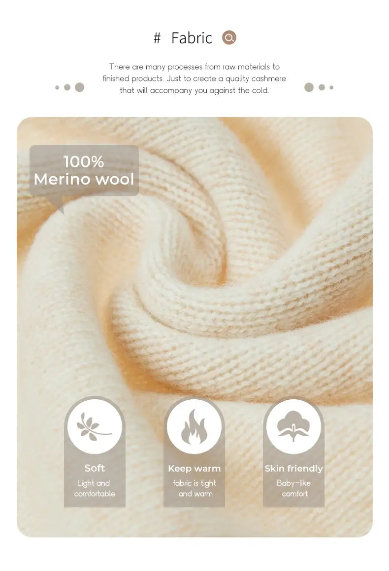 A soft creamy beige merino wool turtleneck sweater vest featuring a fine knit texture made from 100 percent merino wool.