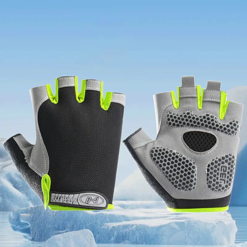 Guantes de ciclismo en color gris y negro con detalles en verde neón, con paneles de malla transpirable para ventilación, mostrados por el lado trasero para su uso en entrenamientos de fitness.