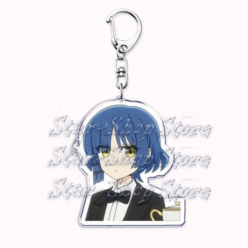 Anime character acrylic keychain from Bocchi the Rock featuring a blue-haired figure with yellow eyes wearing a black tuxedo and bow tie.
