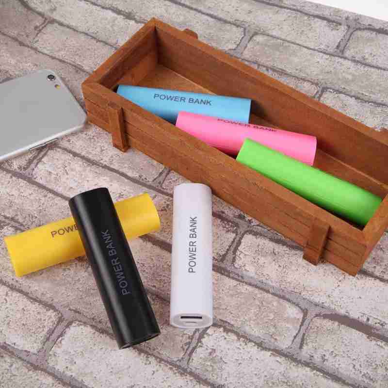 A sleek white cylindrical portable 18650 power bank case diy shell charger with a minimalist design and power bank printed vertically in black.