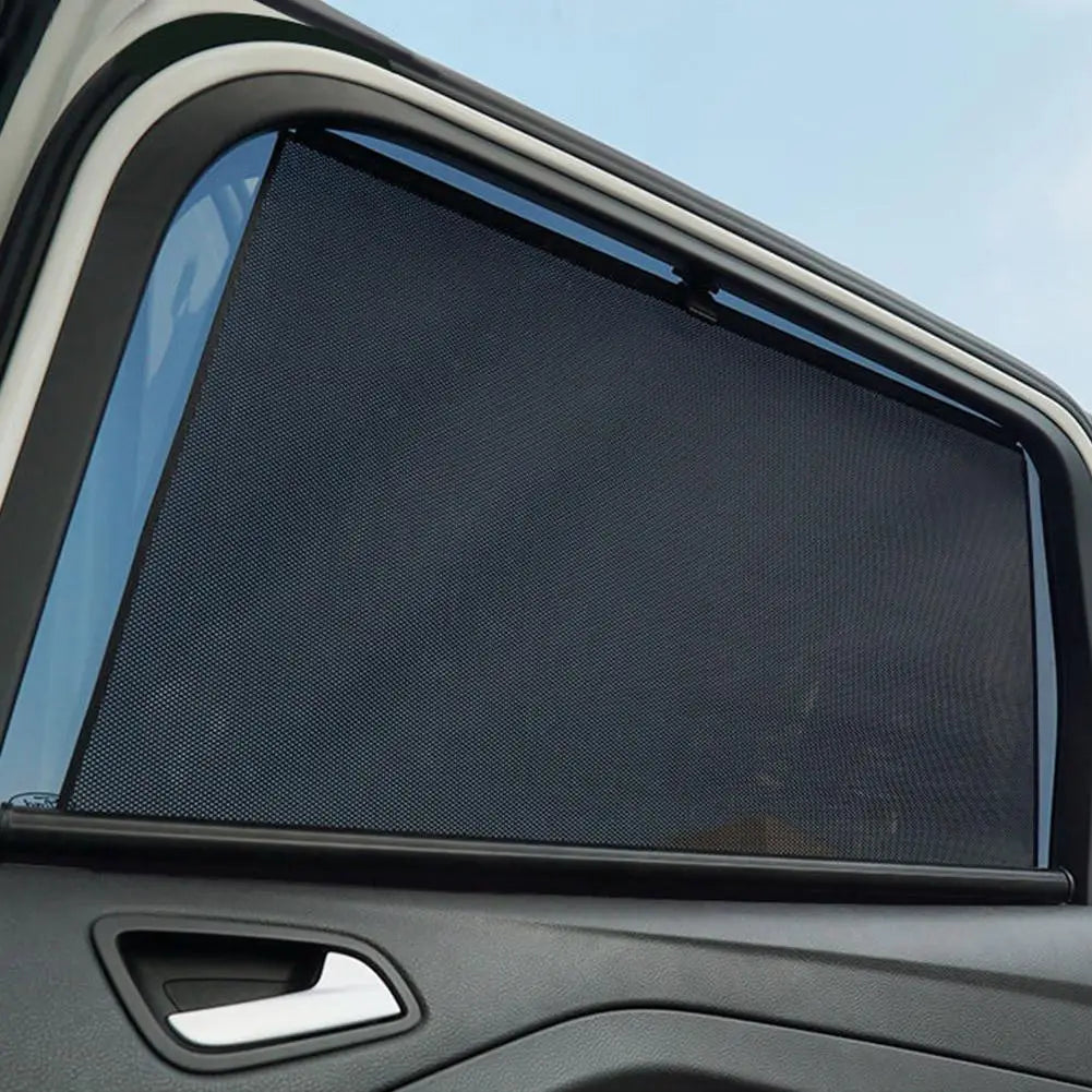 Black mesh retractable car window sunshade with sleek frameless design for UV protection.