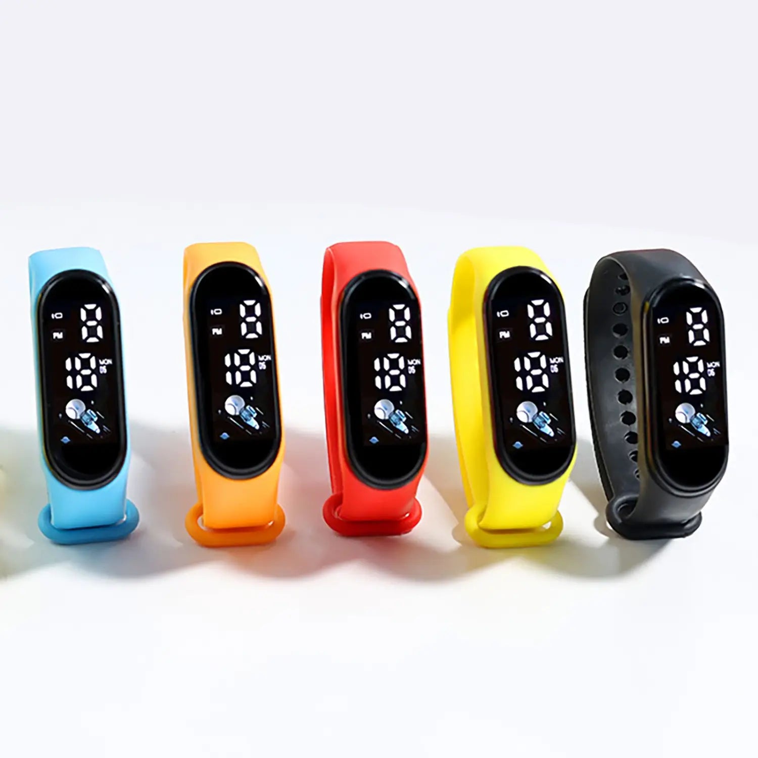 Five colorful kids digital led silicone sports watches with black screens displaying time and date featuring vibrant blue orange red yellow and black silicone straps.