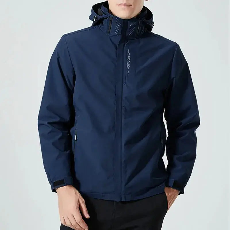 Navy blue men waterproof hiking jacket with hood and zipper closure designed as a windbreaker for outdoor activities.