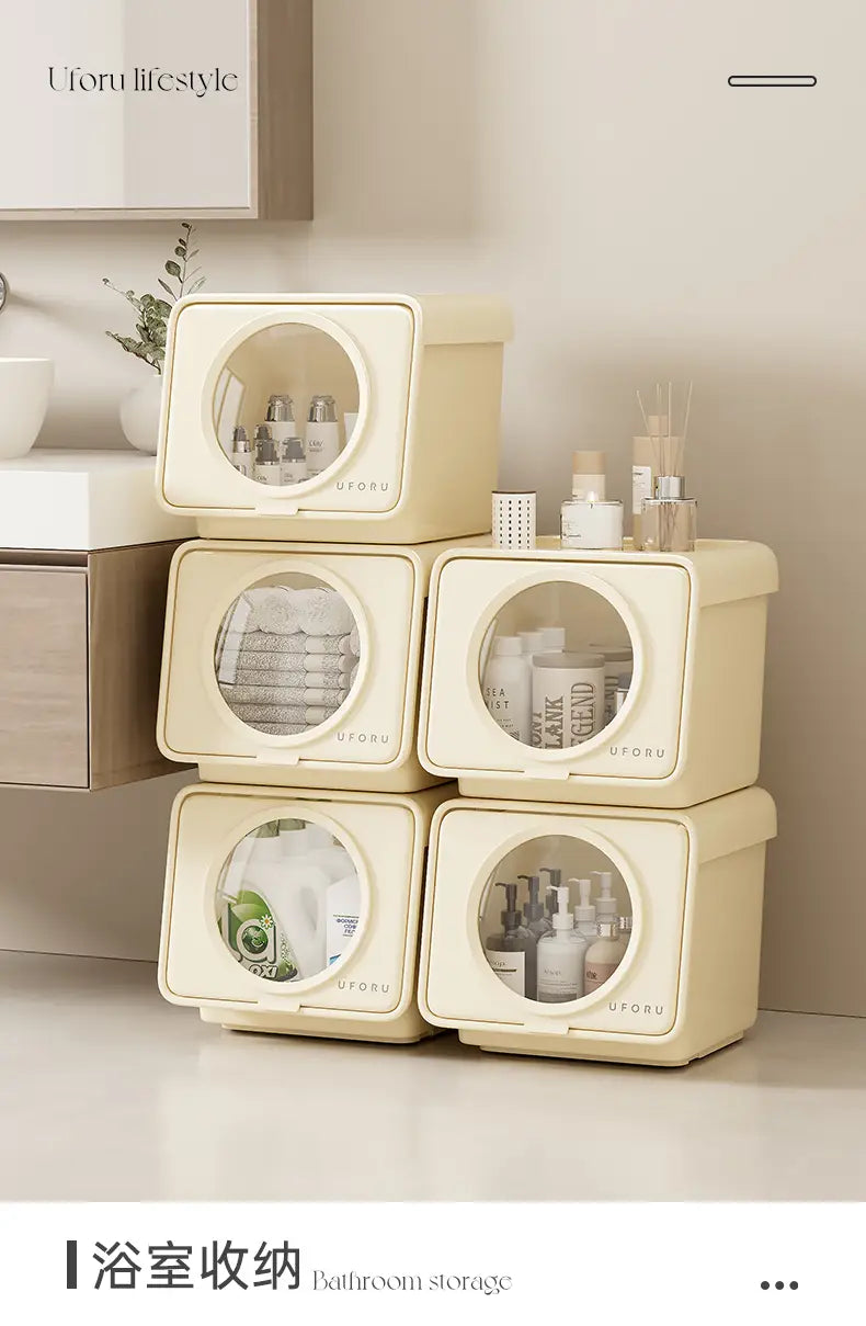 Cream-colored plastic bathroom storage boxes with large capacity and circular transparent windows in a minimalist design from Uforu.