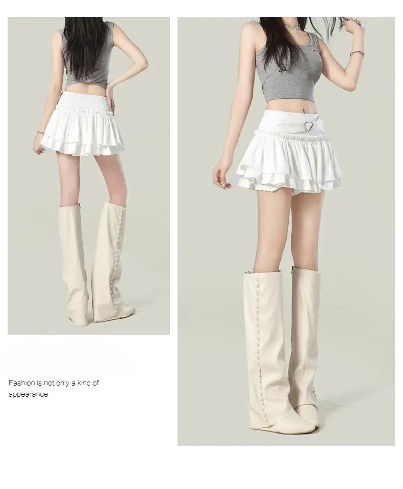 white tiered ruffled high waist mini skirt featuring a heart-shaped belt buckle in a y2k style