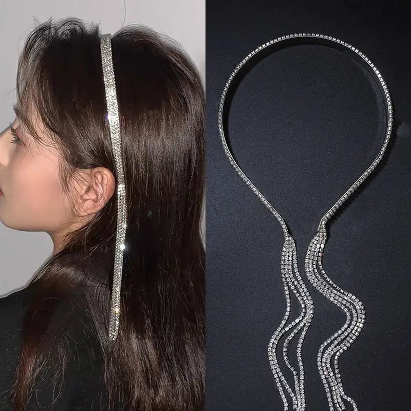 A sparkling silver crystal rhinestone tassel headband for women adorned with a row of clear rhinestones and elegant cascading tassels made from multiple strands of tiny crystals.